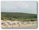 Daymer Bay, Cornwall. This is where Clive found some marine transport to locate his key. Sarah's start position (St Enedoc Church) is visible in the background
